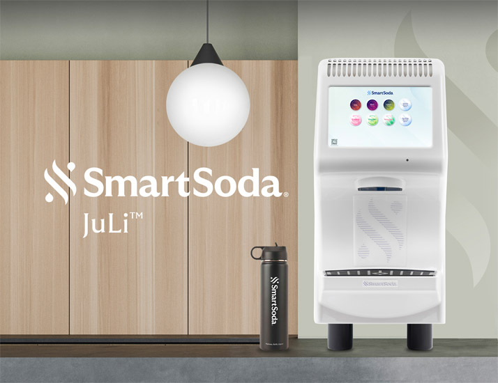 SmartSoda Juli dispenser in modern office breakroom with SmartSoda bottle and logo on display.