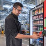 red vending machine in a factory